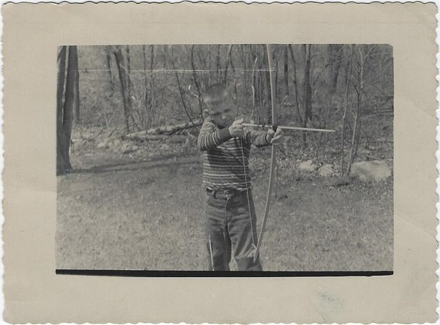 Shooting my Uncle's longbow at about 7 in the mid 50's.